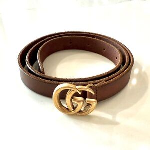 Women’s brown leather Gucci belt. Thin. No scratches or stains.